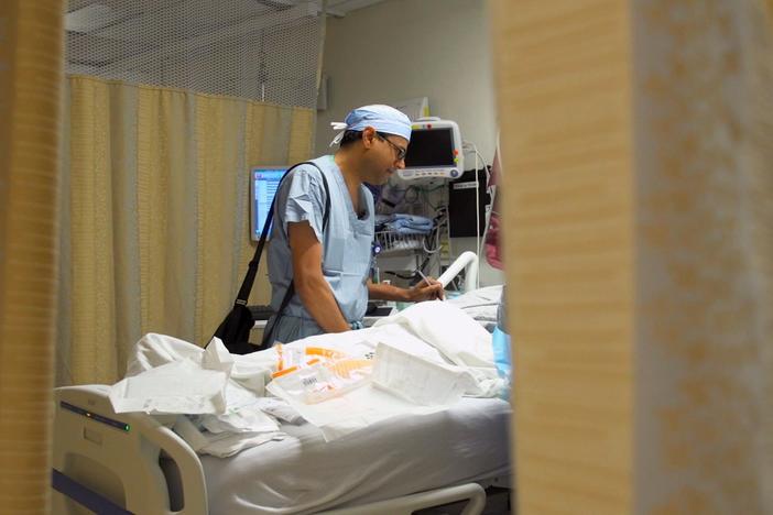 Why are doctors often uncomfortable talking about death with their patients?
