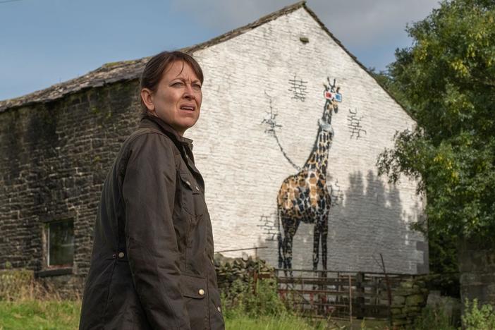 Ted's arrival from New Zealand raises questions. Gillian has trouble with a giraffe.