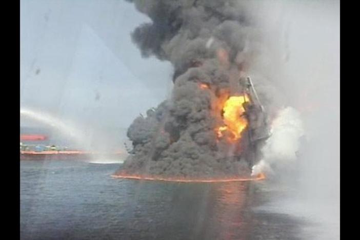 From April 22 - the rig is listing badly and the fire is rolling off onto the water.