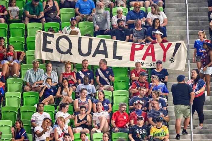 Soccer players on U.S. men's and women's national teams get pay equity for the first time