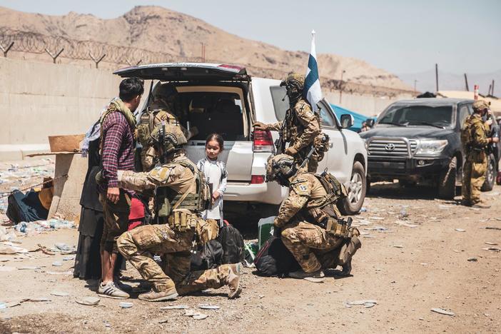 As Afghans bury those killed in Kabul attack, sense of abandonment and anger at U.S. rises