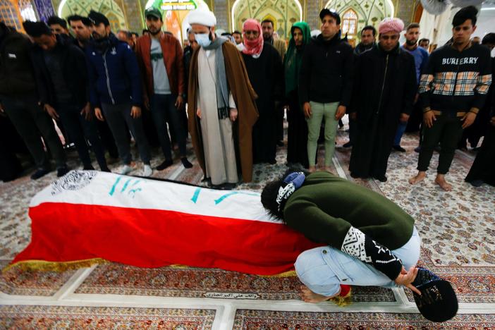 News Wrap: Two suicide bombings kill at least 32 people in Iraq