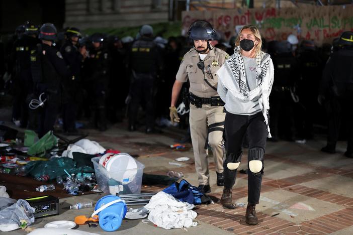 Biden condemns violence and disorder as some college protests escalate into confrontations