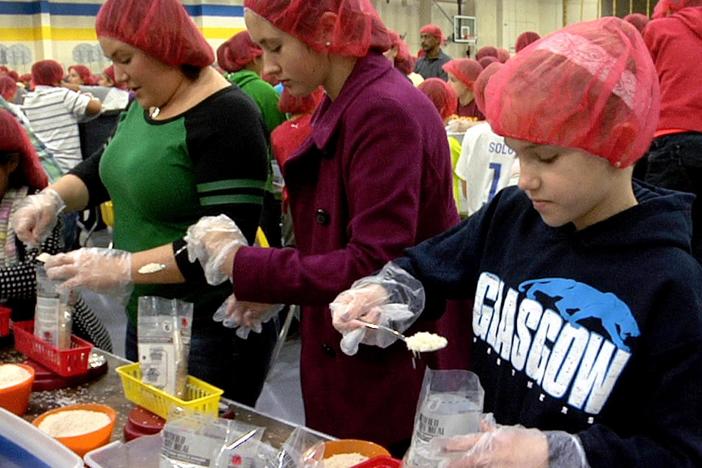A community church in Virginia works with Stop Hunger Now to feed hungry children.