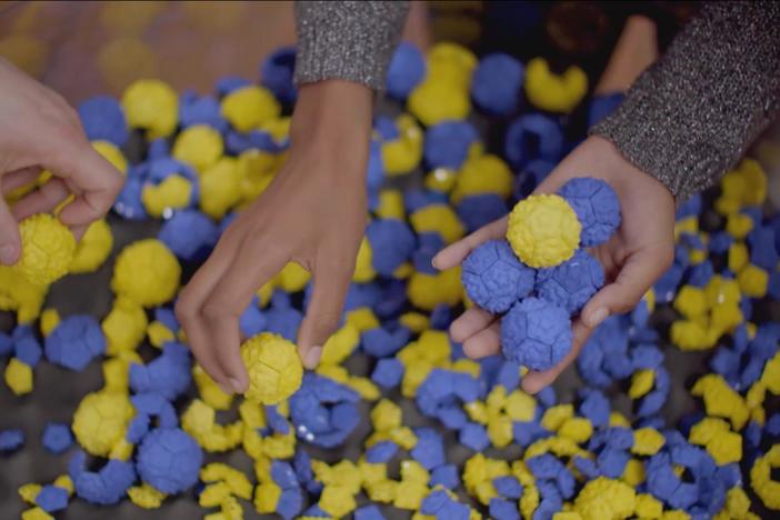An experiment with magnets demonstrates how energy allows atoms to be created.