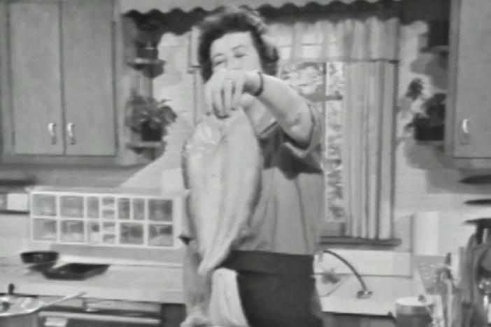 The French Chef Julia Child presents a recipe for fish filets, with sauce and mushrooms.
