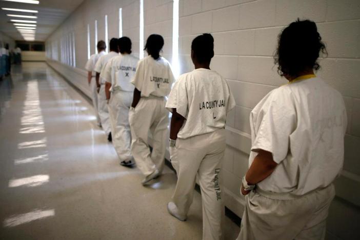Prison inmates struggle to survive unrelenting heat without air conditioning