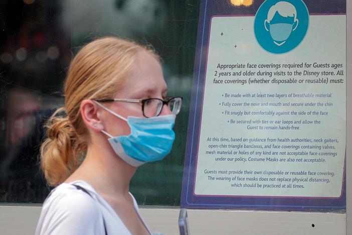 Missouri public health official abused by hostile crowd over support for mask mandate