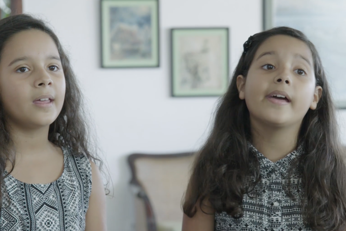 Talented twins Adriana and Andrea Gavilan share their passion for playing the piano.