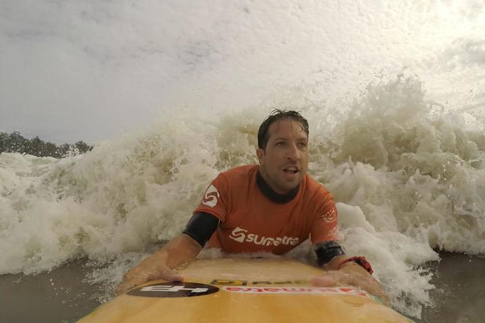 Surfer Serginho Laus rides the Prororoca Wave, a tidal wave on the Amazon River in Brazil.