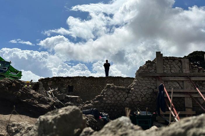 Archaeologists in Pompeii begin to reconstruct an elaborate, intricately painted fresco.
