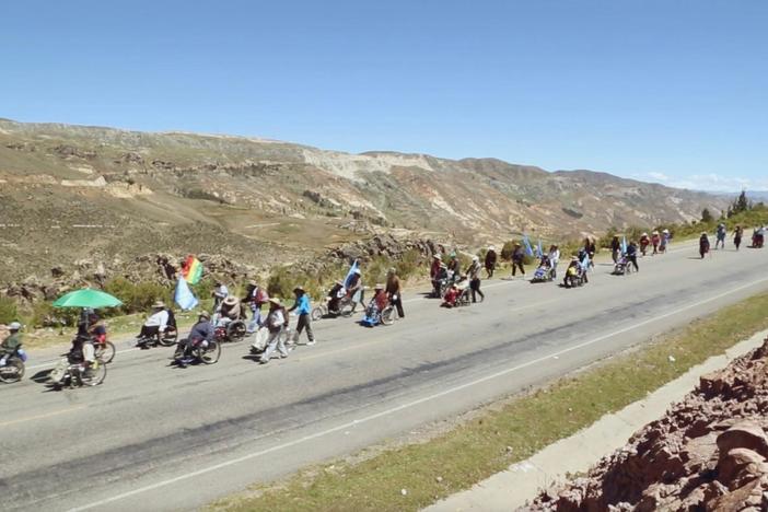 The protestors travel 380 km from Cochabamba to La Paz in their wheelchairs and by foot.