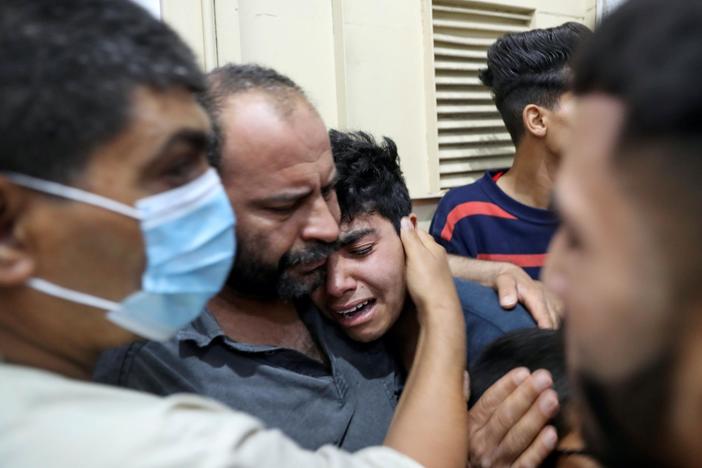News Wrap: 13 dead after roadside bombings follow girls school attack in Afghanistan