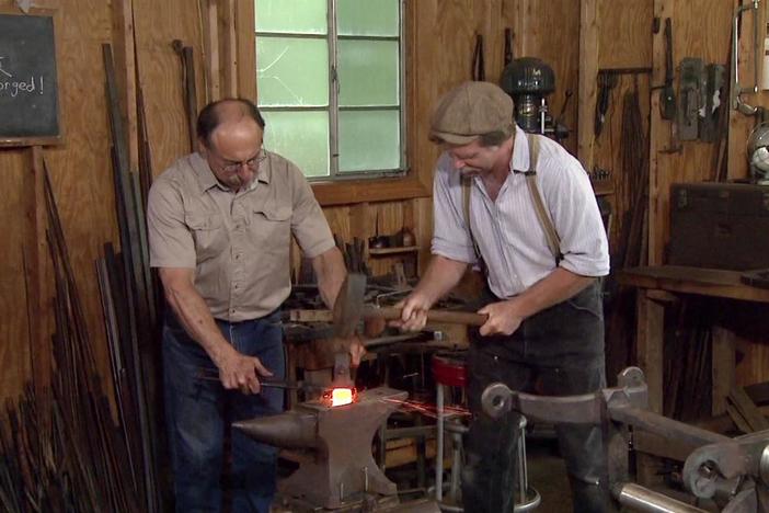 Dividers, calipers and turning tools take shape as master blacksmith Peter Ross shows Roy.