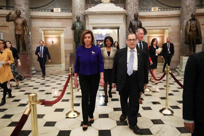 Divided day on Capitol Hill sees articles of impeachment, trade agreement