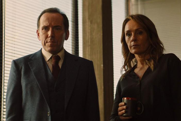 Professor T imagines going on a date with Christina while they talk about a case.