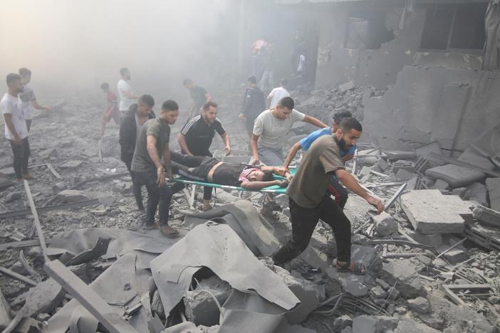 Mass exodus begins in Gaza as Israel tells people to leave ahead of more raids
