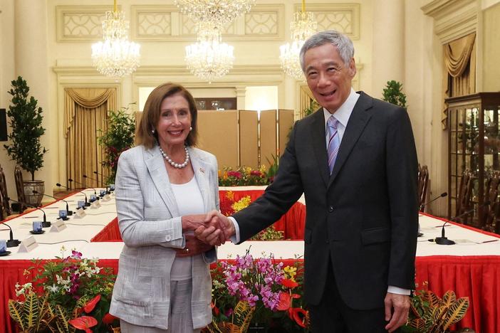 News Wrap: Pelosi begins Asian tour with stop in Singapore