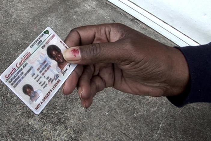 What is the real purpose of strict new voter identification laws?