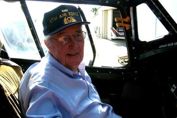 Jack Pelton takes Wes inside the cockpit of a B-24 bomber.