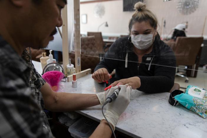 What businesses and consumers think about state moves to reopen