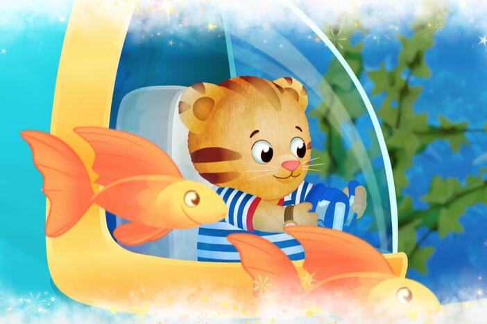 Daniel makes believe he can travel in a submarine to see what's on the ocean floor.
