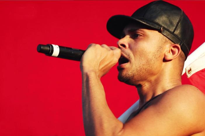 Caribbean-American D.J. Walshy Fire electrifies audiences with dancehall-inspired beats.