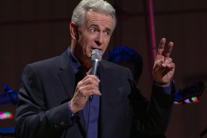 Naughton skewers political history in this sardonic ballad by Randy Newman, 