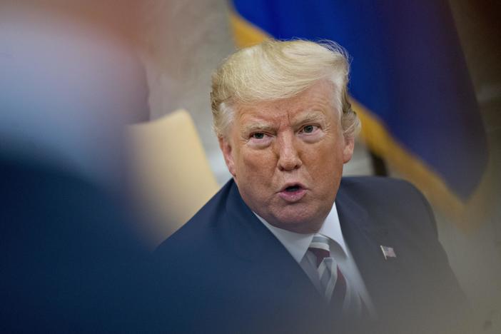 Trump defends China trade policy amid economic worries