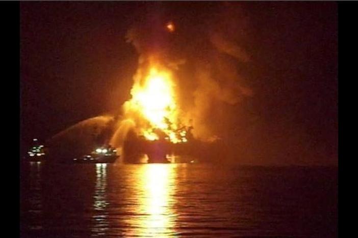 This footage was shot within a mile of the rig, which was fully engulfed in flames.
