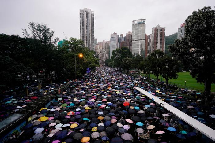 Nearly 2 million protest in Hong Kong, as Chinese forces gather near the border