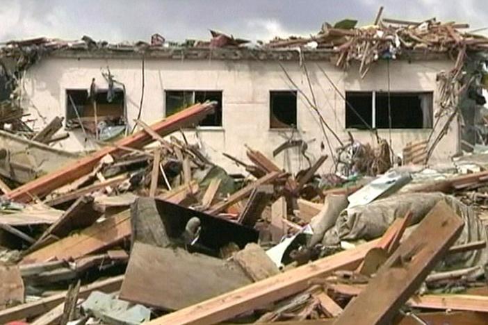 Do the religious traditions of the Japanese help them cope with natural disasters?