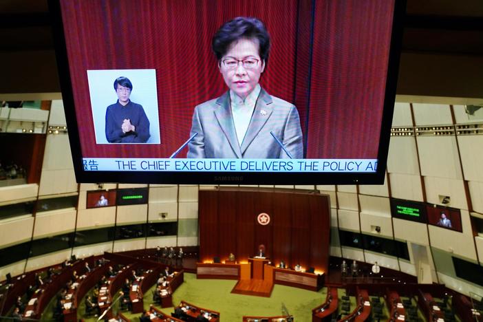 News Wrap: Hong Kong's leader says law criminalizing dissent has brought stability