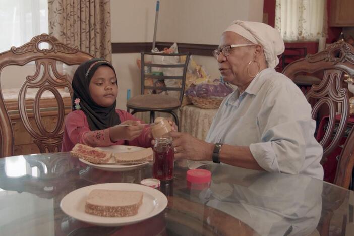 Real kids and their grandparents spend time together in their community.