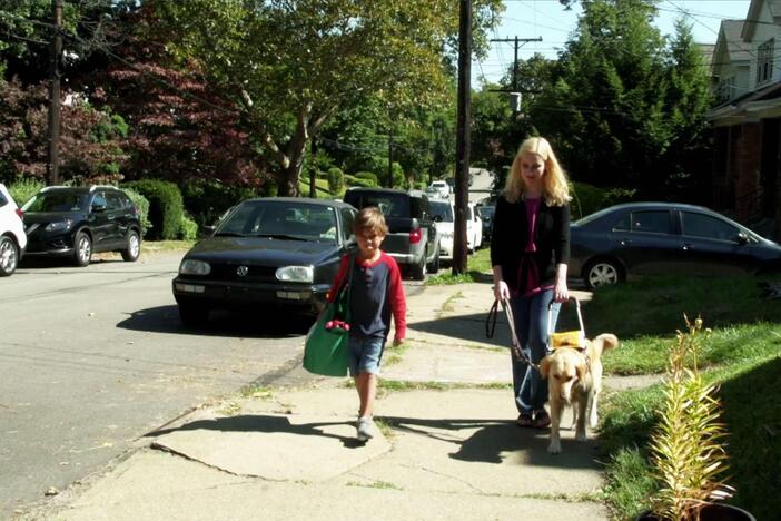 Tristan helps his neighbor Ann, who is blind, by carrying her groceries.