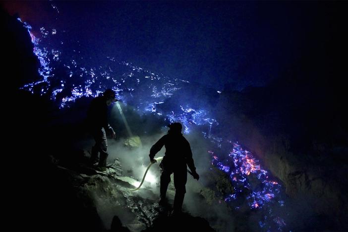 At the Kawah Ijen volcano in Indonesia, bright yellow elemental sulphur is mined.