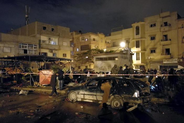 The death toll rose to 33 in Libya from two car bombings in Benghazi.