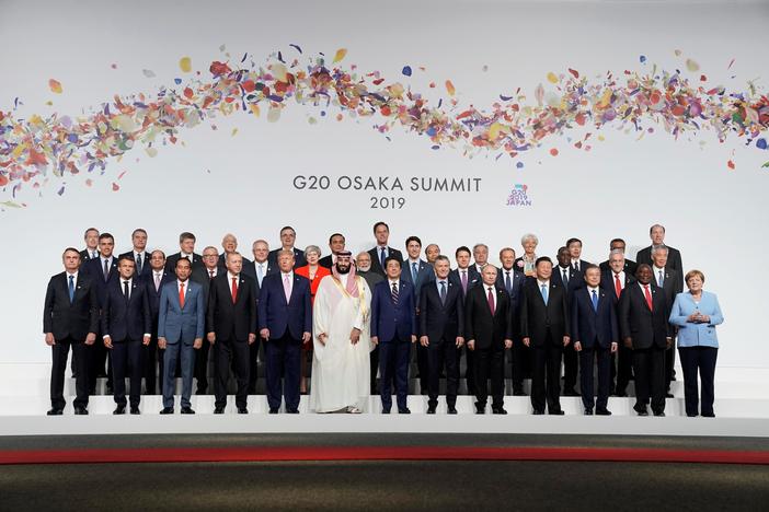 At the G-20, Trump delivers warning on election meddling with a grin