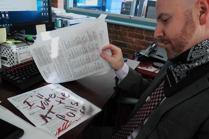 Rhode Island election official Rob Rock reads through the hate mail over mail-in voting.