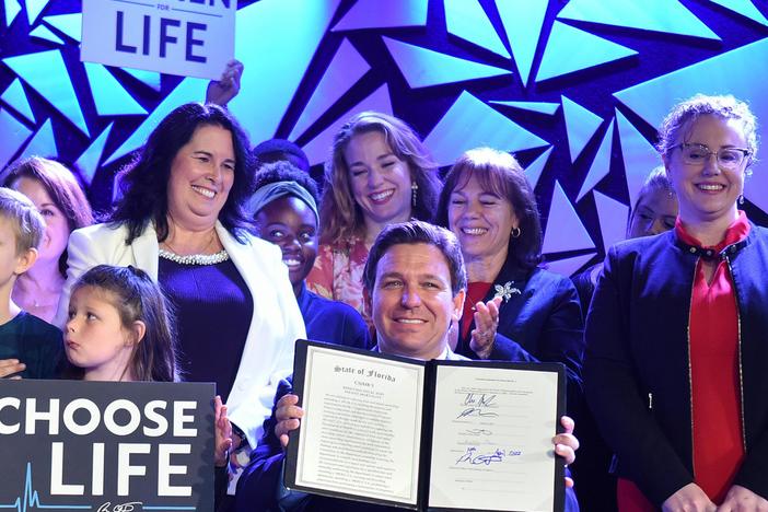 News Wrap: Kentucky, Florida judges block abortion limits
