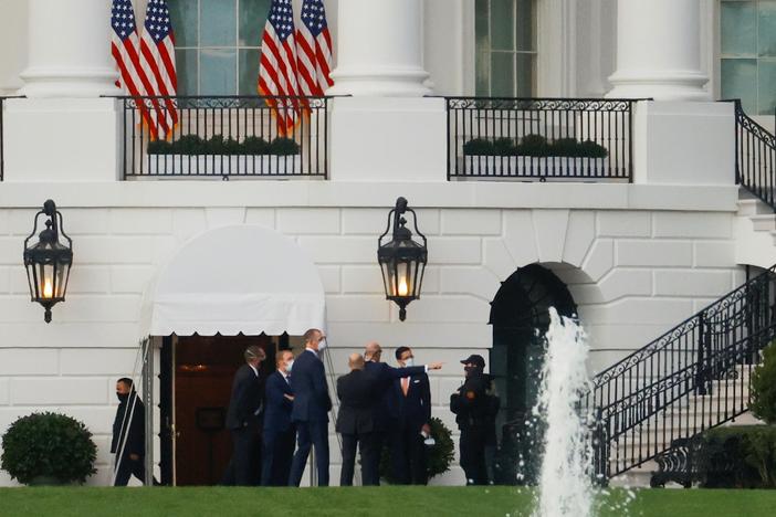 How are White House staffers reacting to Trump's diagnosis?