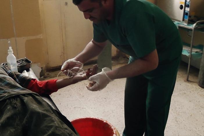 We see nurse Nori Sharif at work in the Jalawla Hospital in Iraq’s Diyala province.