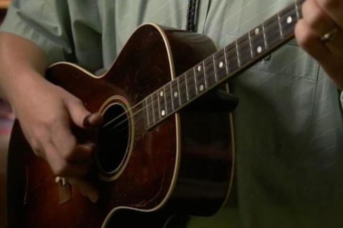Mark Lee Gardner performs a ballad about Billy the Kid during his interview for the film.