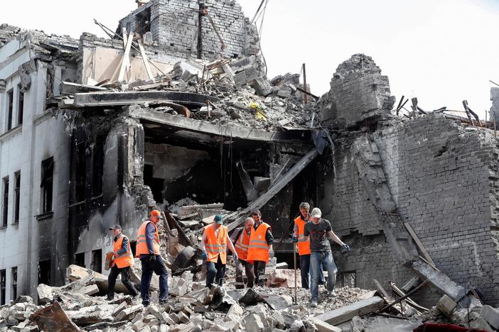 Ukrainian forces dig in against Russia's eastern assault as the U.S. pledges more aid