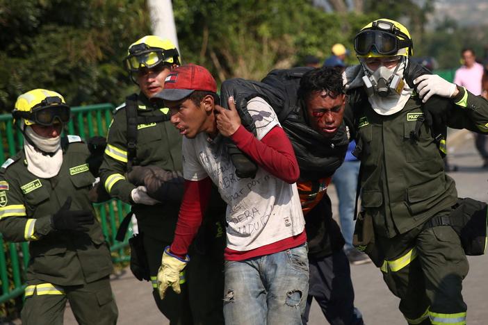 Venezuela's political battle over foreign aid turns to violent confrontation