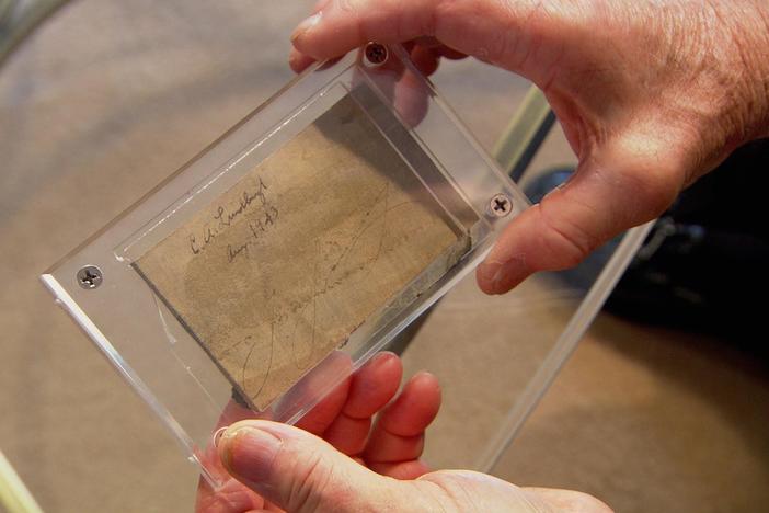 Signatures on a piece of fabric connect Charles Lindbergh to another first in flight.
