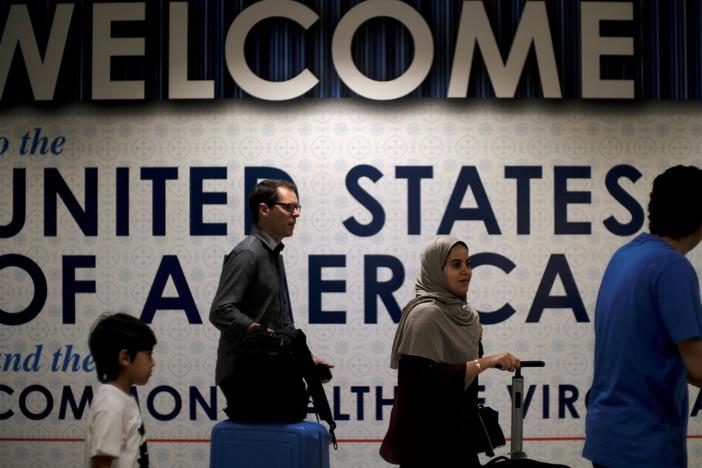 Trump's new visa, green card restrictions are 'about bigotry,' says critic