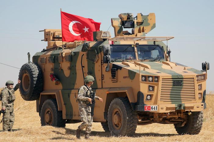 News Wrap: Turkish forces deploy to Syrian border after U.S. troops leave