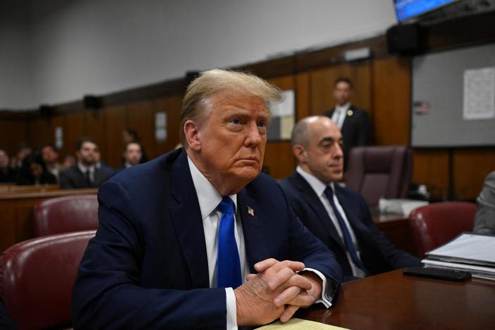What happened in the courtroom during opening statements in Trump's hush money trial