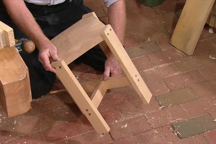 The old shop-class plant stand joined with half-laps and dowels.